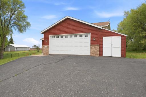 Another view of the front of the home. The extra storage area is attached to the garage.