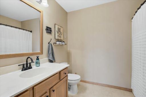 There is a full bath on the lower level of the home near Bedrooms #3 and #4.