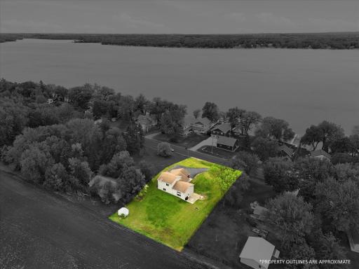 Property outline is highlighted and property lines are approximate.