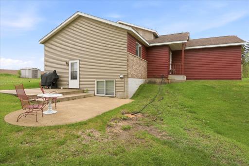 Another view of the walkout level of the home with the large patio area.