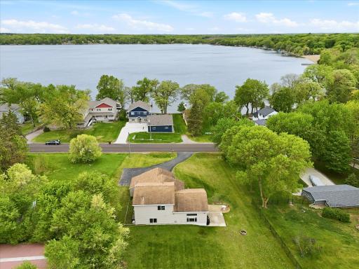 Aerial view shows the lake across the street. Great panoramic view of the area.