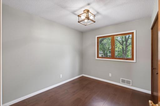 3rd bedroom with engineered hardwood floor
