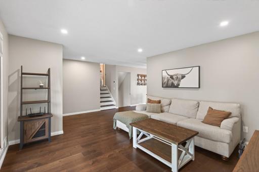 Comfortable gathering space with bright neutral finishes