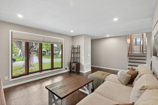 Living room showcasing oversized picture window and natural light