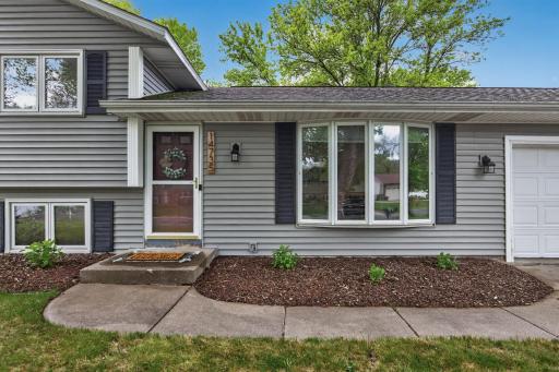 Front exterior entrance with landscaped walkway