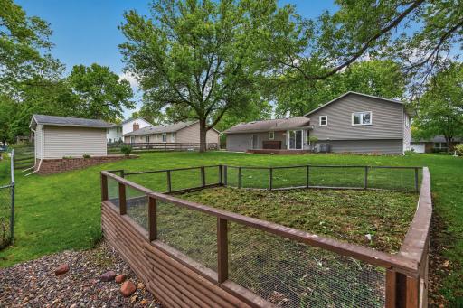 Fenced-in garden space perfect for gardening enthusiasts