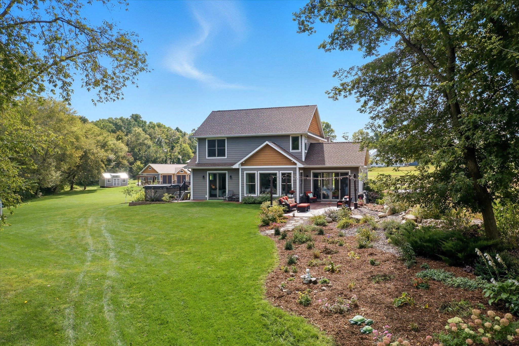 Landscaping includes gardens, perennials, mulch beds, and more