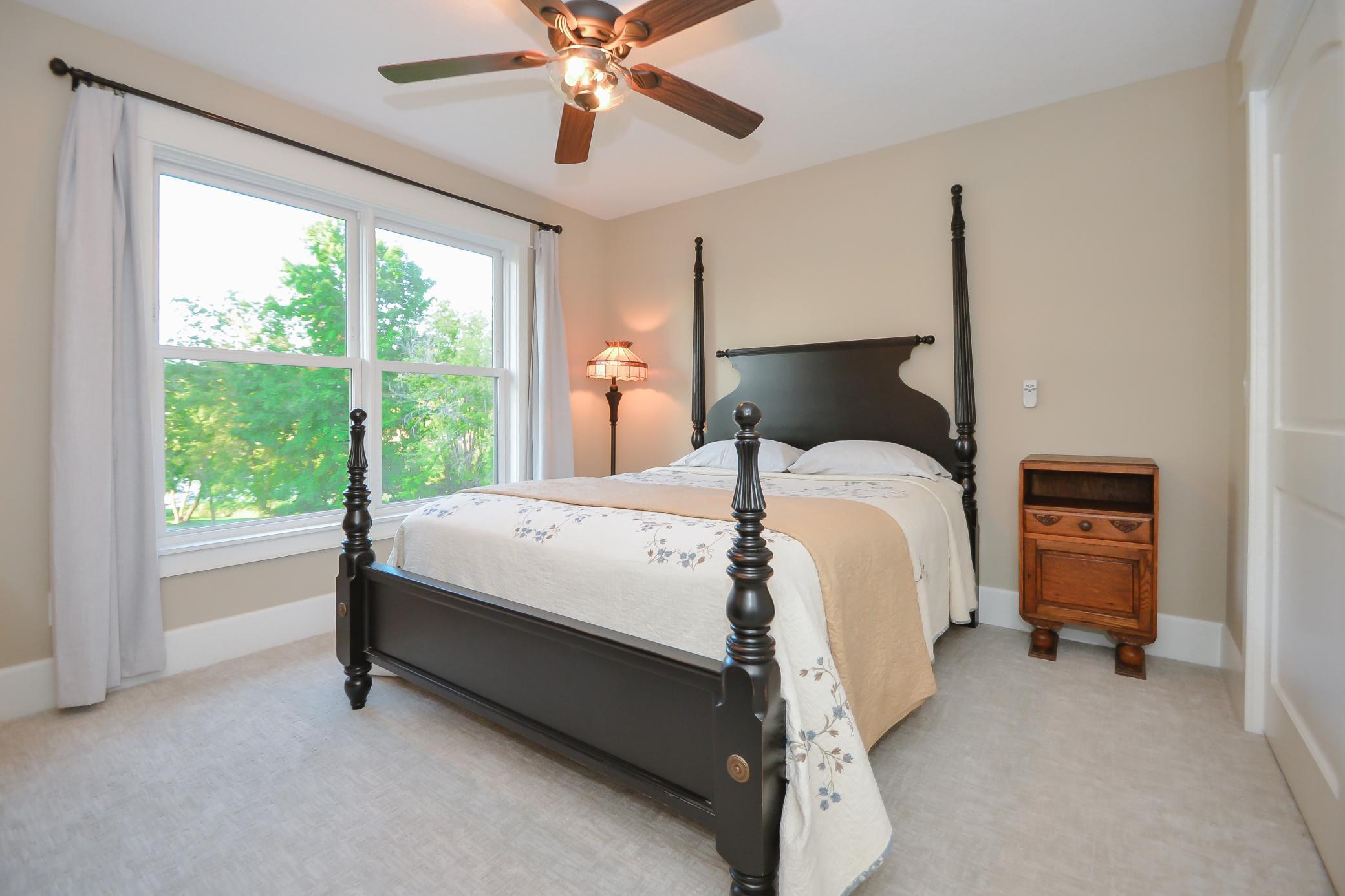 Upstairs features two additional bedrooms, loft family room, full bath with jetted tub.