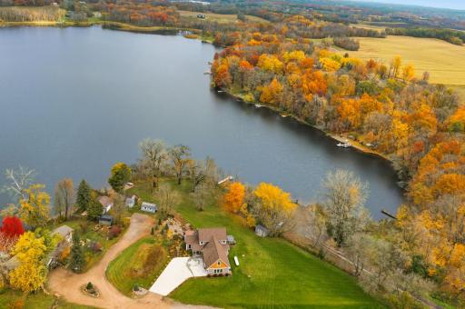 Step outside and enjoy the ultimate Minnesota lake lifestyle with a sandy shoreline, professionally landscaped grounds, waterfalls, mature trees, fruit trees, gardens, and 11-person spa overlooking the lake.