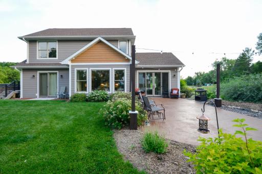 Built in 2022 by CAP Custom Homes, this executive retreat combines timeless craftsmanship, modern luxury, and breathtaking panoramic lake views less than an hour from the Twin Cities.