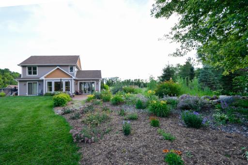 Landscaping includes gardens, perennials, mulch beds, and more