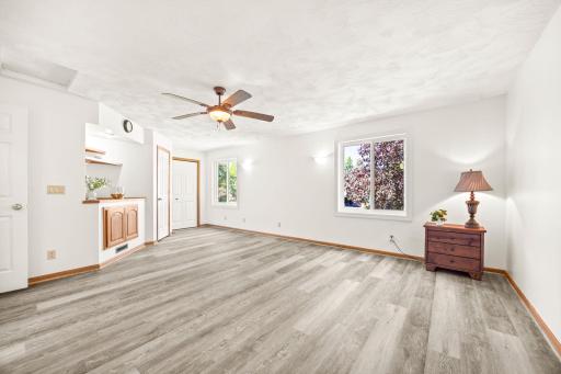 The spacious primary bedroom offers new windows (2026), a walk-in closet and 2nd closet and private ensuite bathroom.