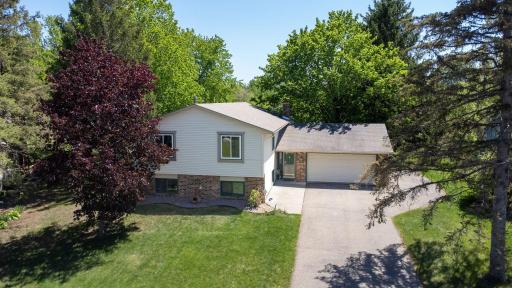 Lovingly cared for with additional parking space next to the garage for your convenience.