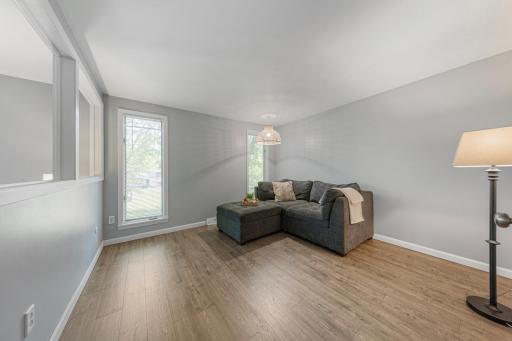 Check out this awesome primary bedroom bonus space! So many ways to utilize this space- two large windows bring in plenty of sunlight.