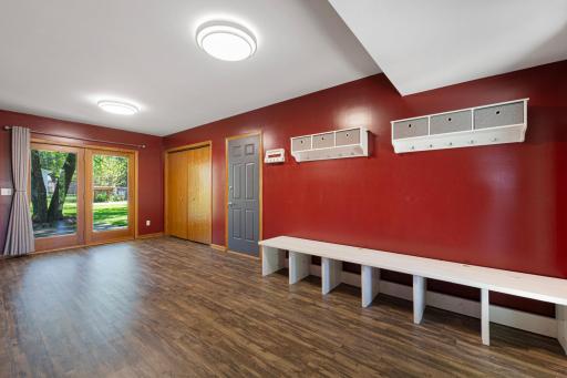 Multi-functional room! This is the entry from the attached garage, but also the front entrance of the home. There's ample storage space for shoes, backpacks, coats, sports equipment and more!
