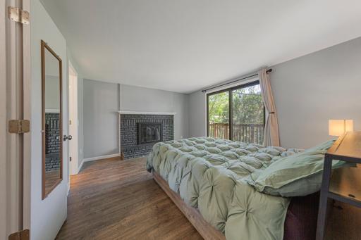 Oh, did we mention the second fireplace is in the primary bedroom? This could also be a great sitting area. There's also a private balcony deck!