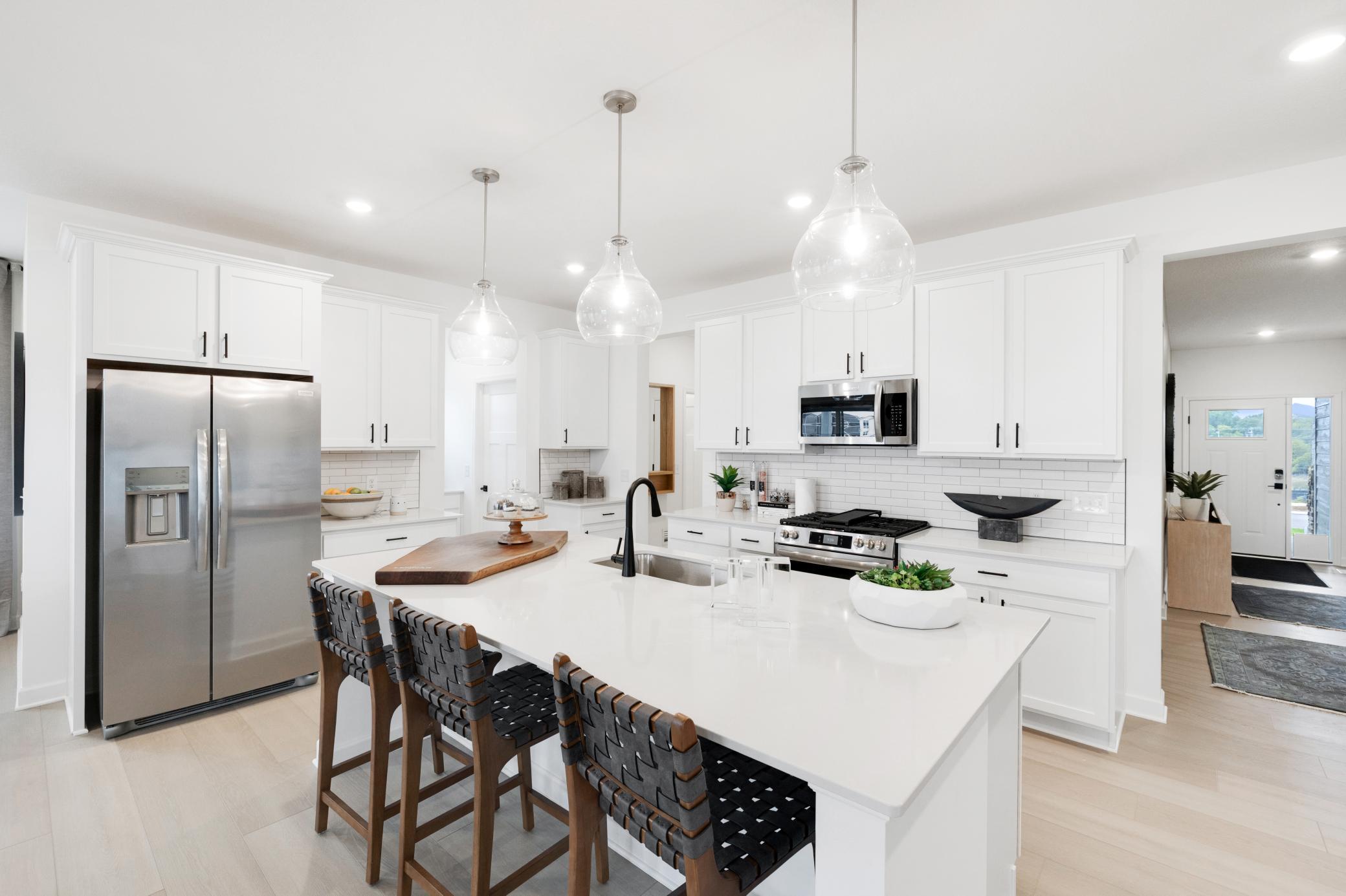 (Photo of a decorated model, actual home's finishes will vary slightly)