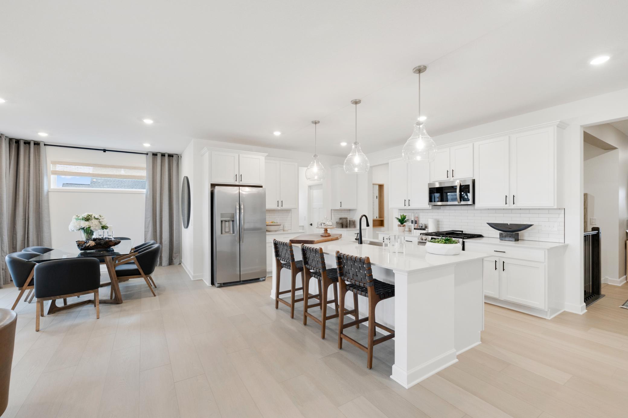 (Photo of a decorated model, actual home's finishes will vary slightly)