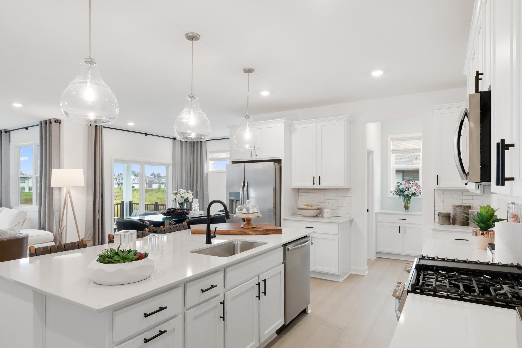 (Photo of a decorated model, actual home's finishes will vary slightly)