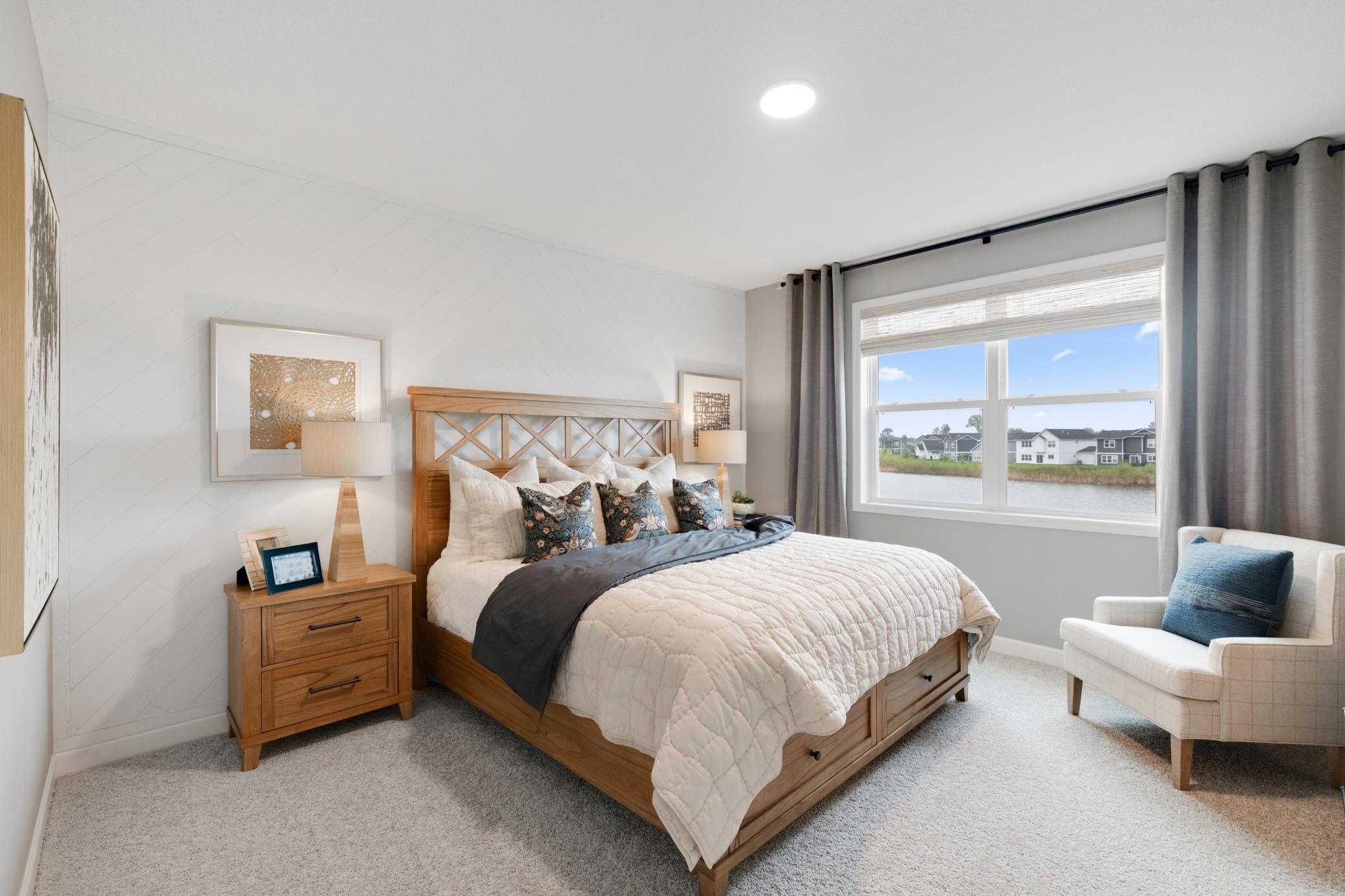 (Photo of a decorated model, actual home's finishes will vary slightly)