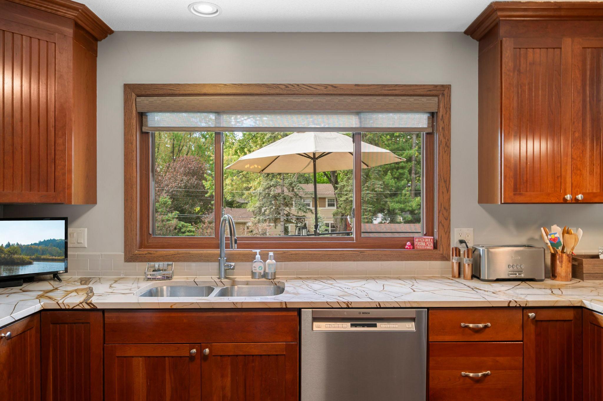 Overlook the backyard from the large kitchen window