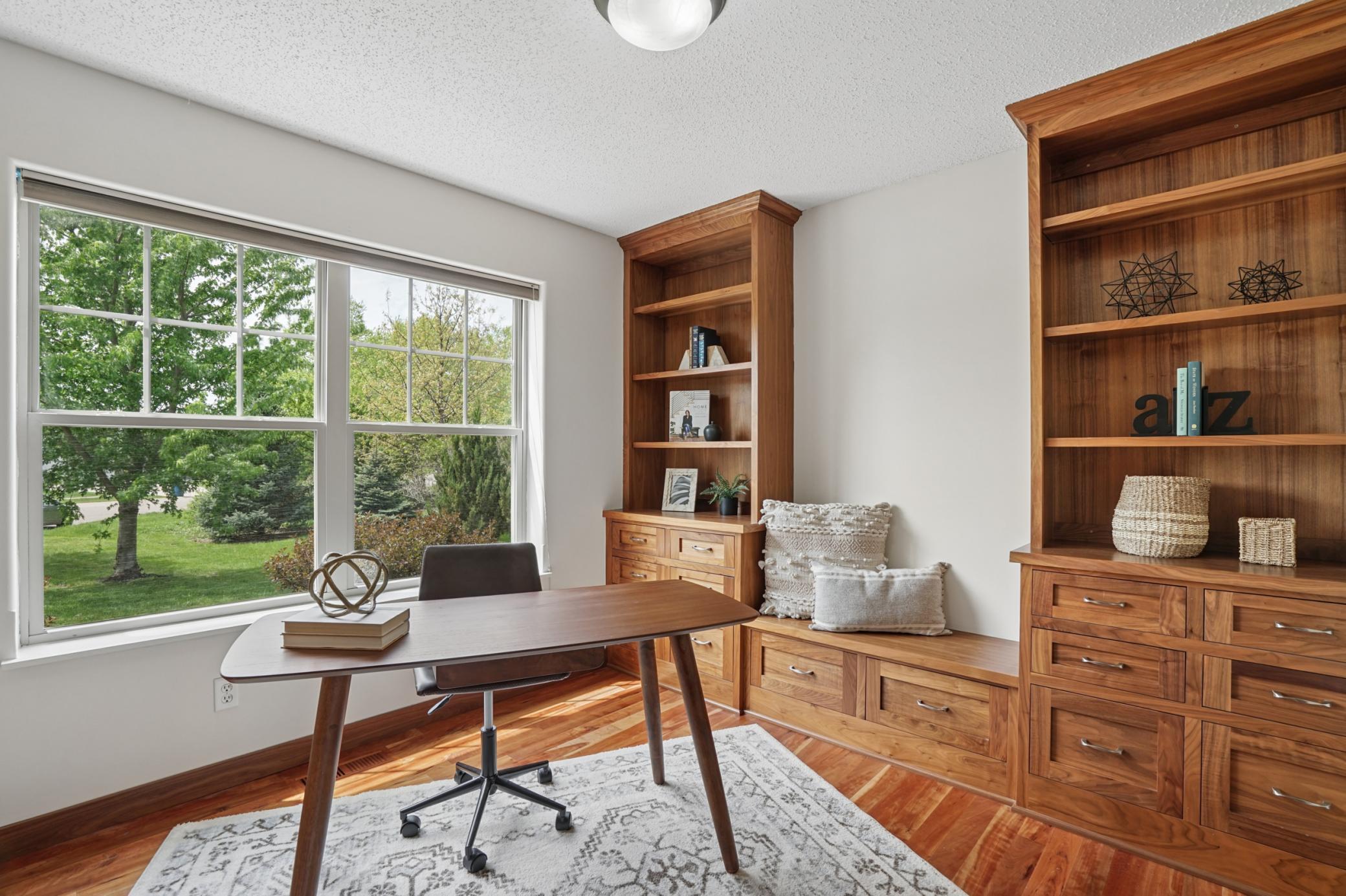 3rd bedroom on main with custom cabinetry