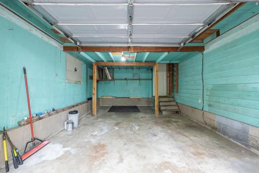 Attached 1 stall garage with direct access to backyard or into kitchen / back entry space.