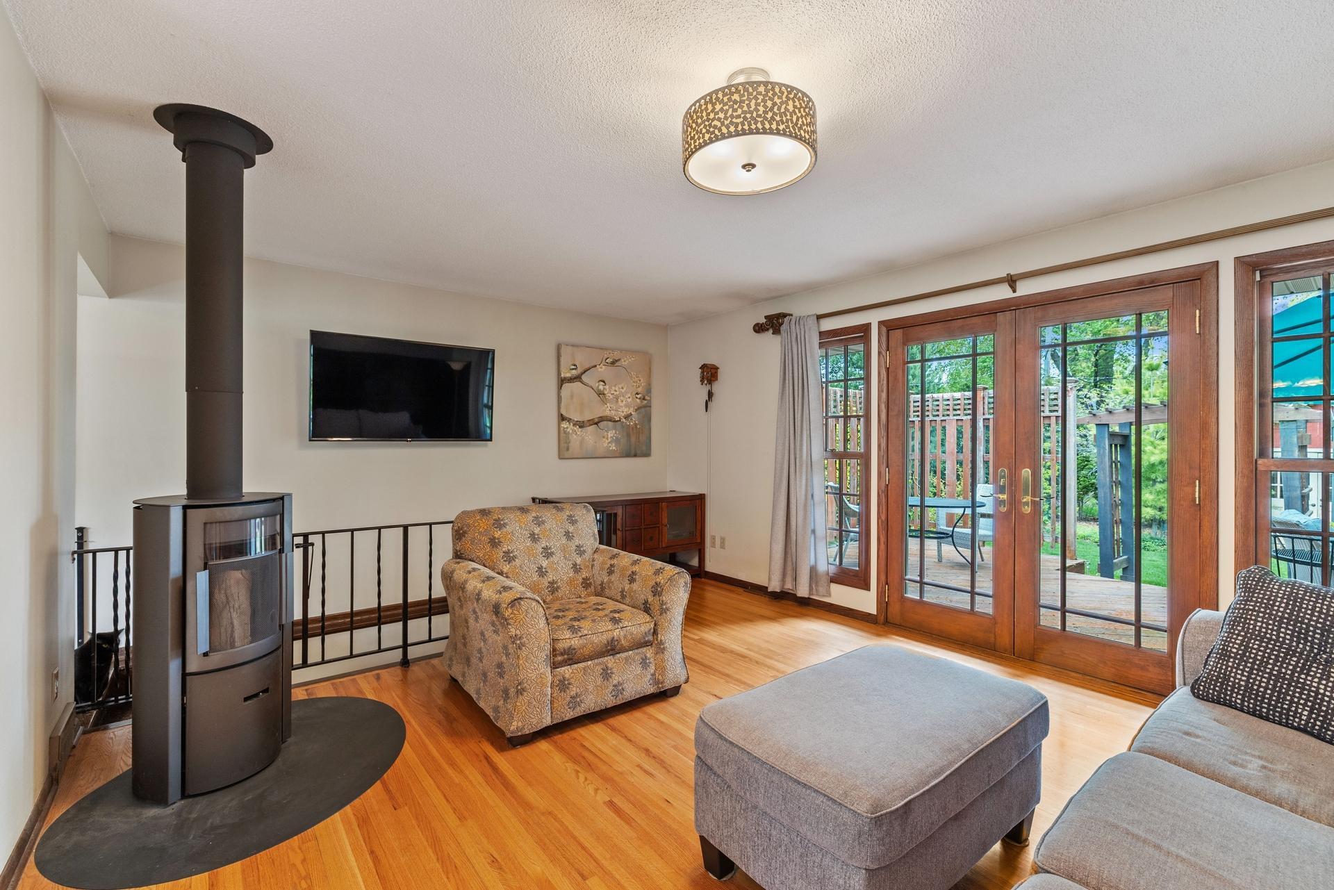02 Living room with wood-burning fireplace.jpg