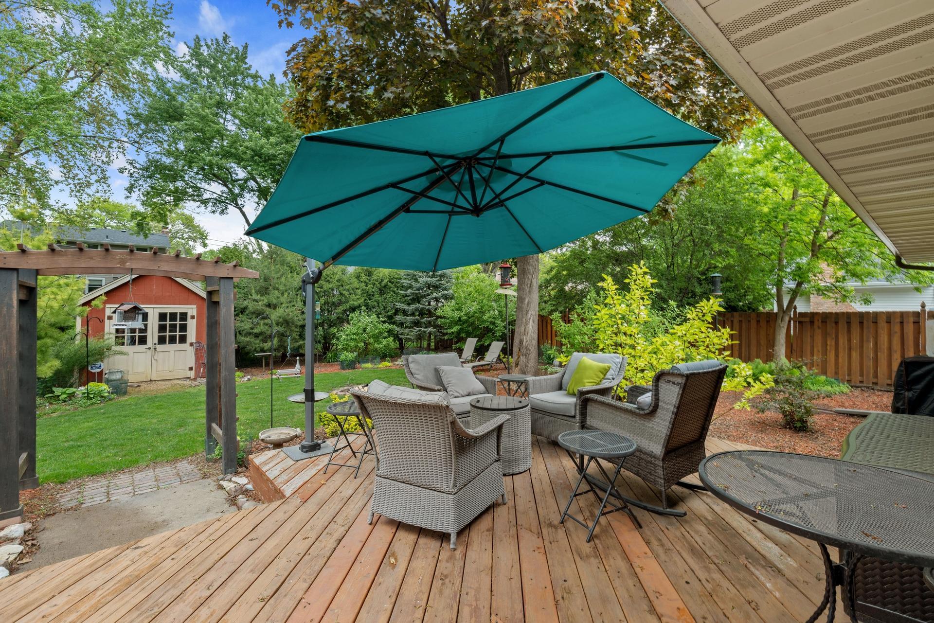 18 Umbrella stand bolted to deck will stay.jpg