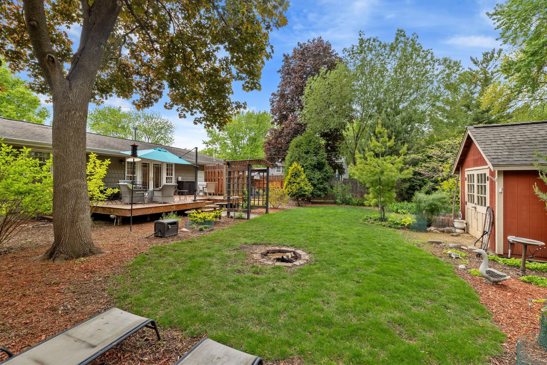 17 Fully fenced back yard with storage shed.jpg
