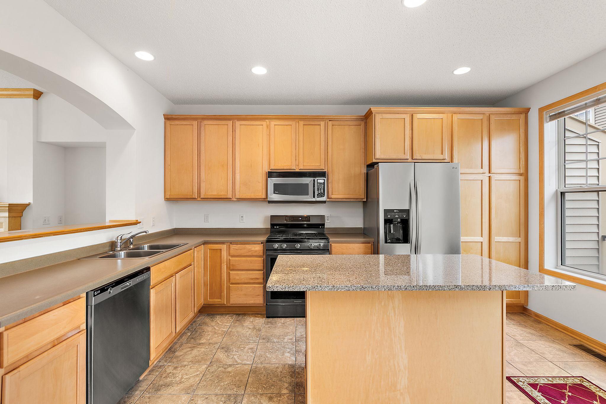 Spacious kitchen with center island and informal dining room