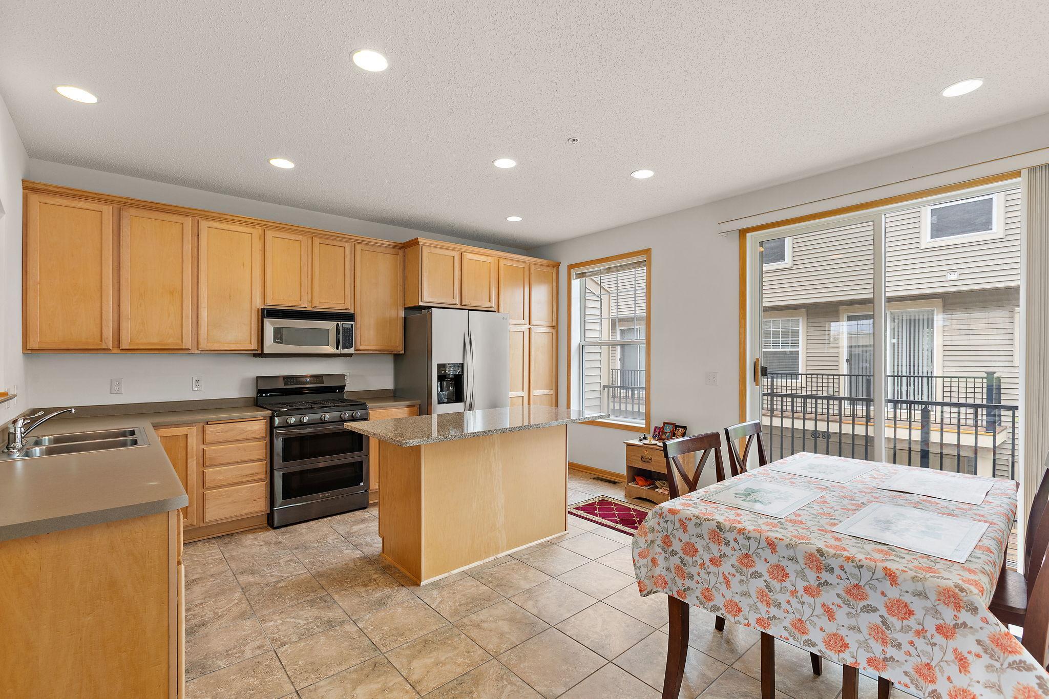 Spacious kitchen with center island and informal dining room