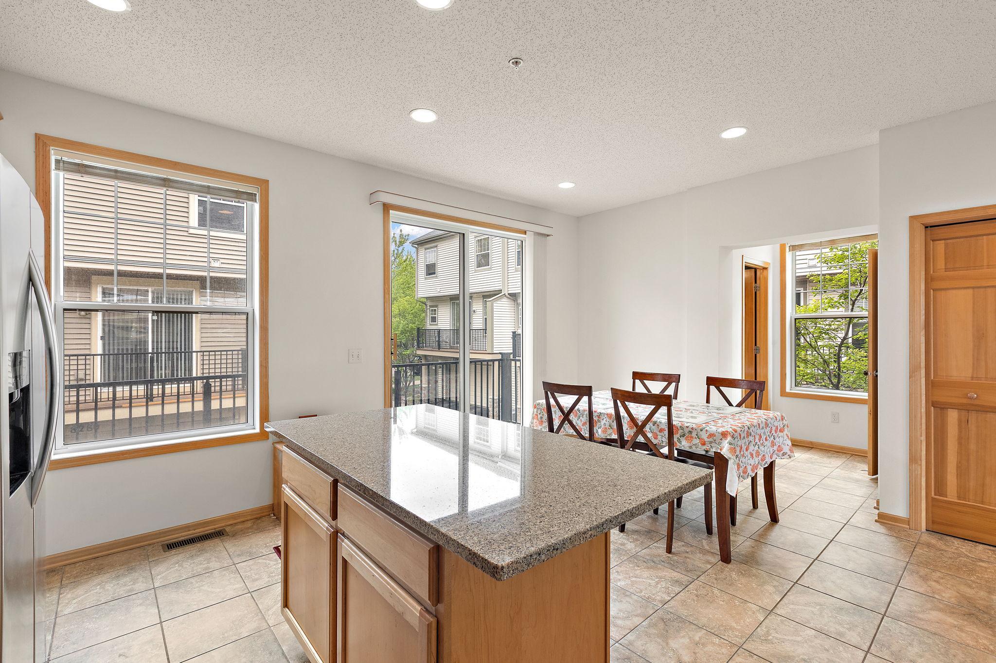 Spacious kitchen with center island and informal dining room