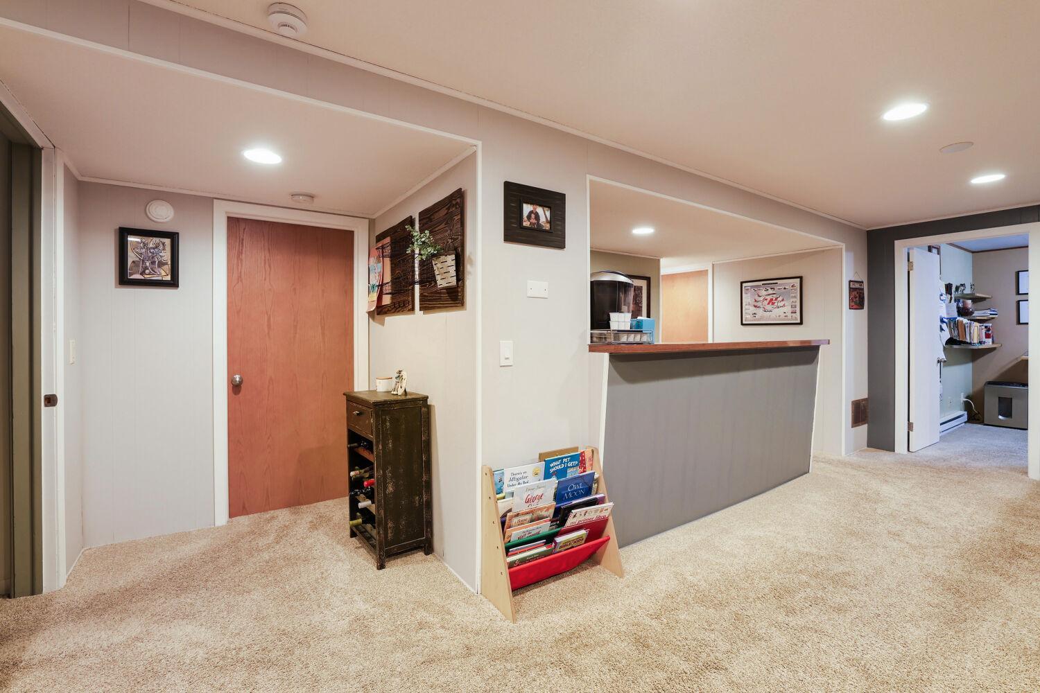Wet bar in family room, the door to the left is the laundry room
