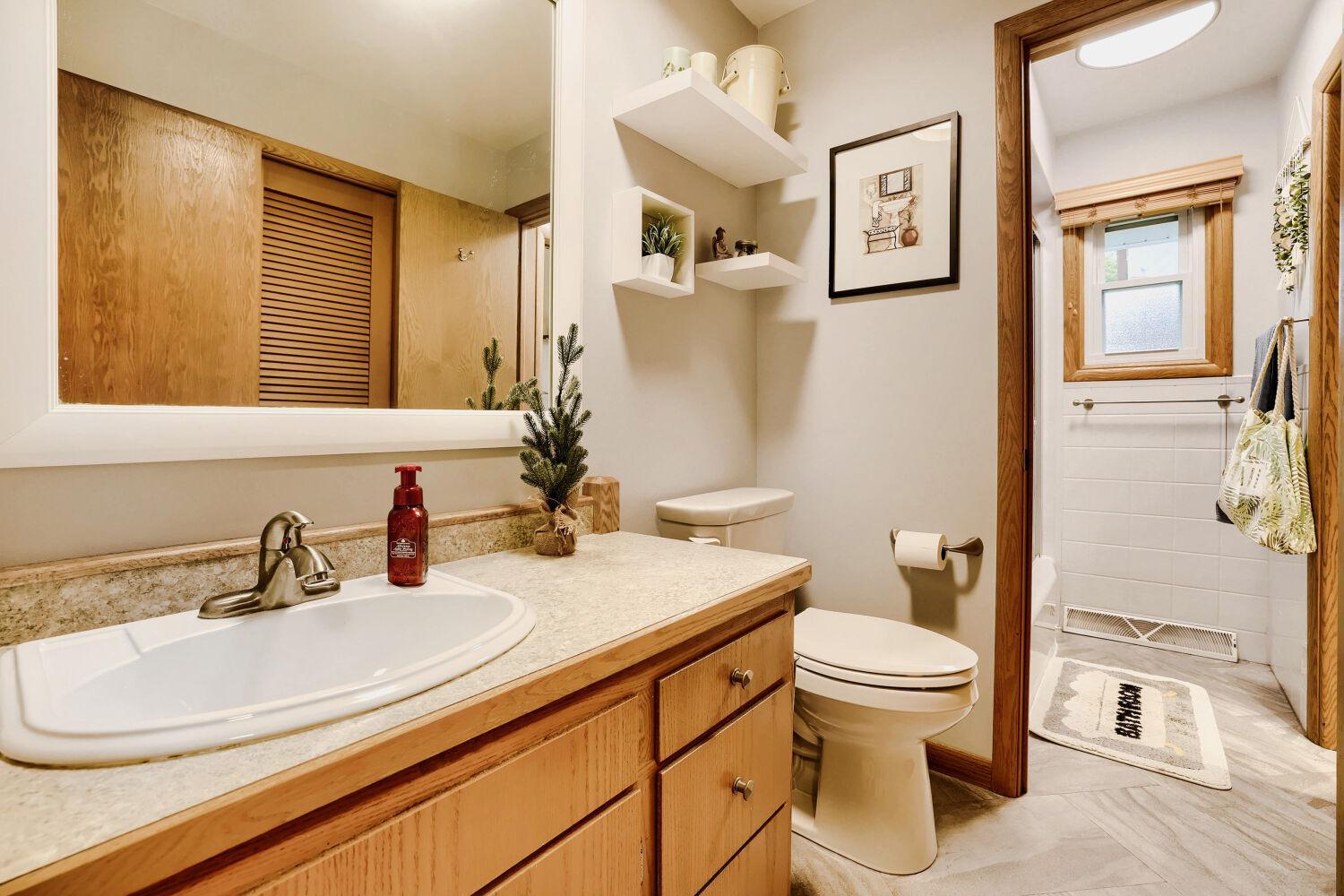 Primary walk-through bathroom