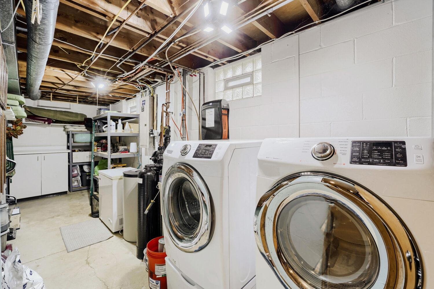 Large laundry room with ample storage