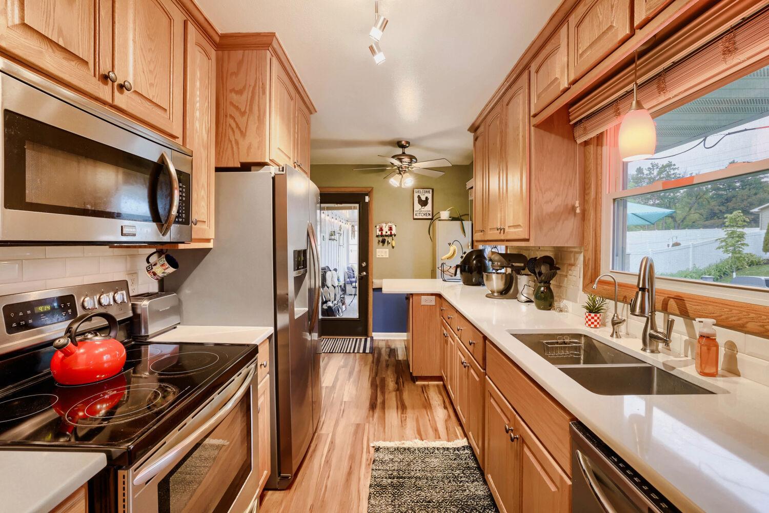 Kitchen view looking towards screened porch