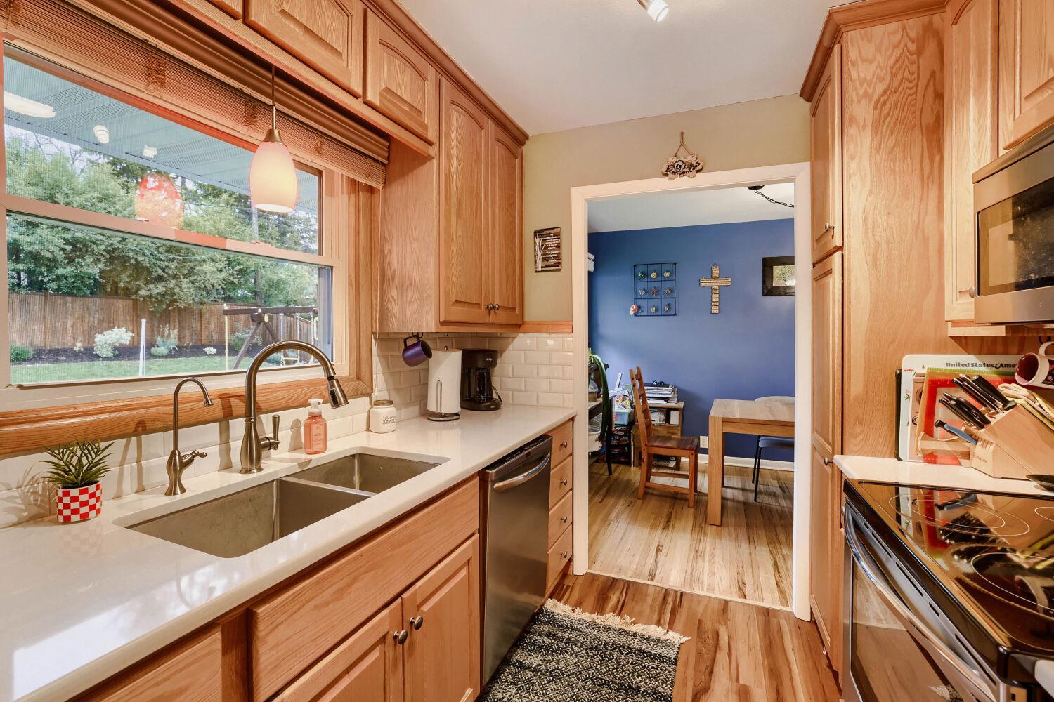 Opposite view of kitchen looking into dining room