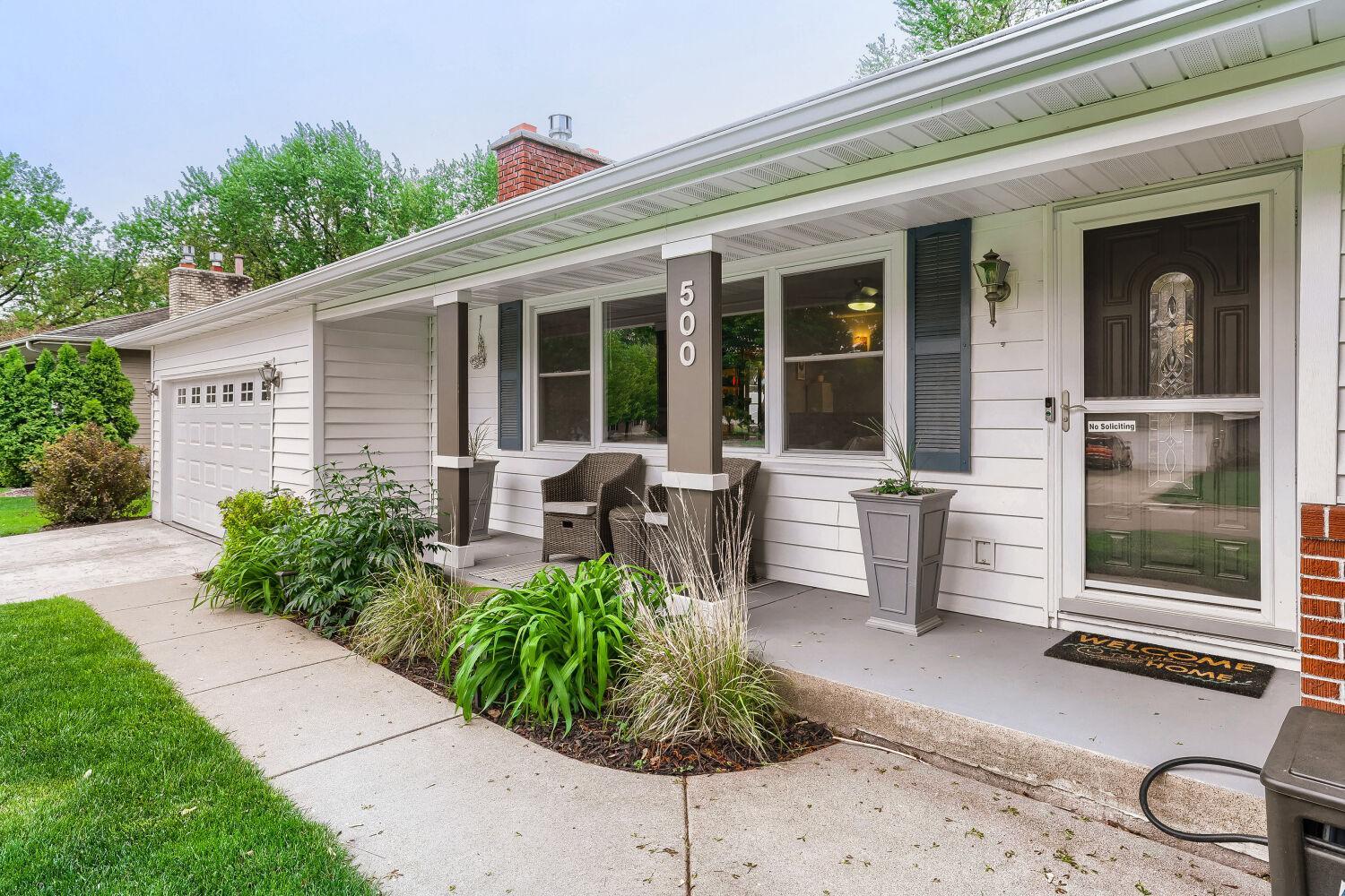 Covered front porch with room for seating