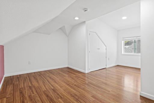 Upper Level Bedroom-owners had a bed, dresser, sitting area and a desk on the far end