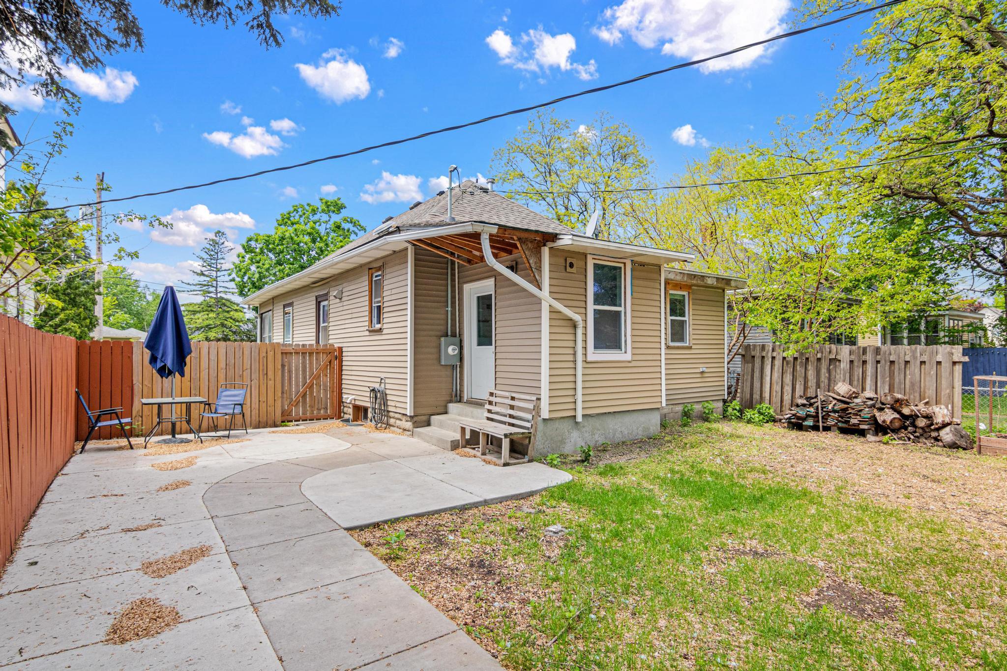 Tucked away from the bustle and giving a sense of privacy perfect for summer evening gatherings! Concrete patio!