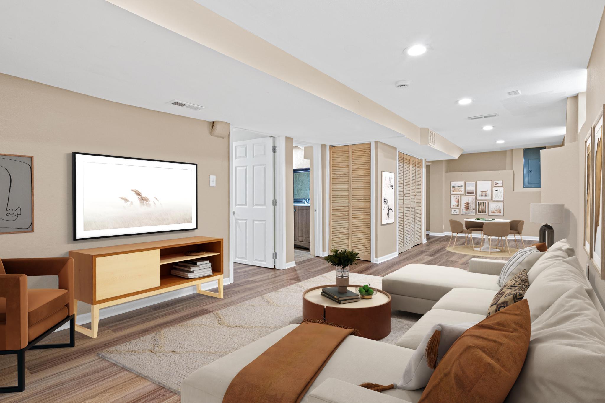 The lower level offers a space to relax. (Virtually Staged)