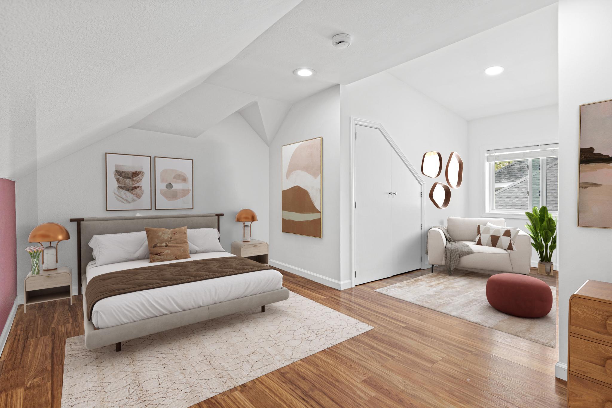 Upper level bedroom has a nook for a desk or sitting area. Two big closets and its own 3/4 bathroom! Picture makes the space look a little bigger than it is. This is a space that will hold a full size bed or twin nicely. (Virtually Staged)
