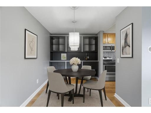 Your beautiful dining room! Built-in cabinetry for extra functionality. This photo has been virtually staged to display the livability.