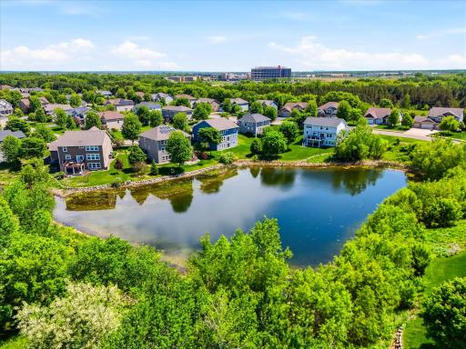 Wonderful views of the pond and nature from the deck and many windows throughout the home.