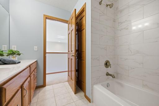 This recently renovated full bathroom is conveniently located on the upper level of the home.