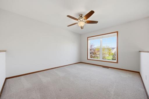 This versatile upstairs bonus/loft area offers endless possibilities. Measuring approximately 14' x 11', it could easily be converted into a third upstairs bedroom or office, play area, game room, craft room or kids TV room. Lots of possibilities.