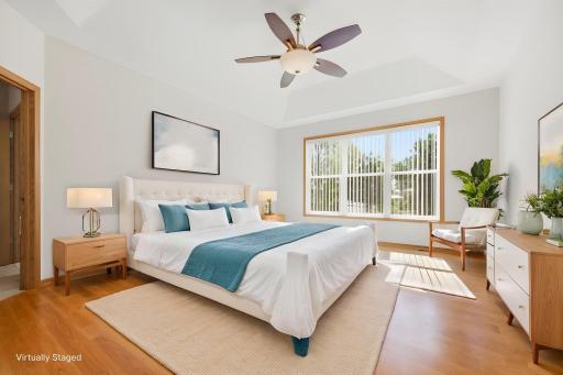 This rendering presents the primary bedroom with refreshed furnishings, offering a vision of its updated potential.