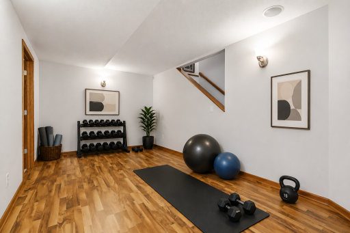 This rendering shows how the bonus room could look if transformed into a workout space.
