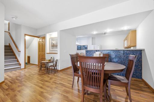 Designed with entertaining in mind, the Lower Level offers an impressive array of amenities, including a full kitchen, dining room, laundry room, guest bedrooms, a spacious living and billiards area, fitness or play space, and private theatre room